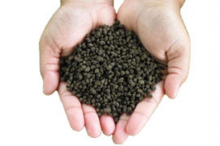 organic fertiliser fertilizer in the hand